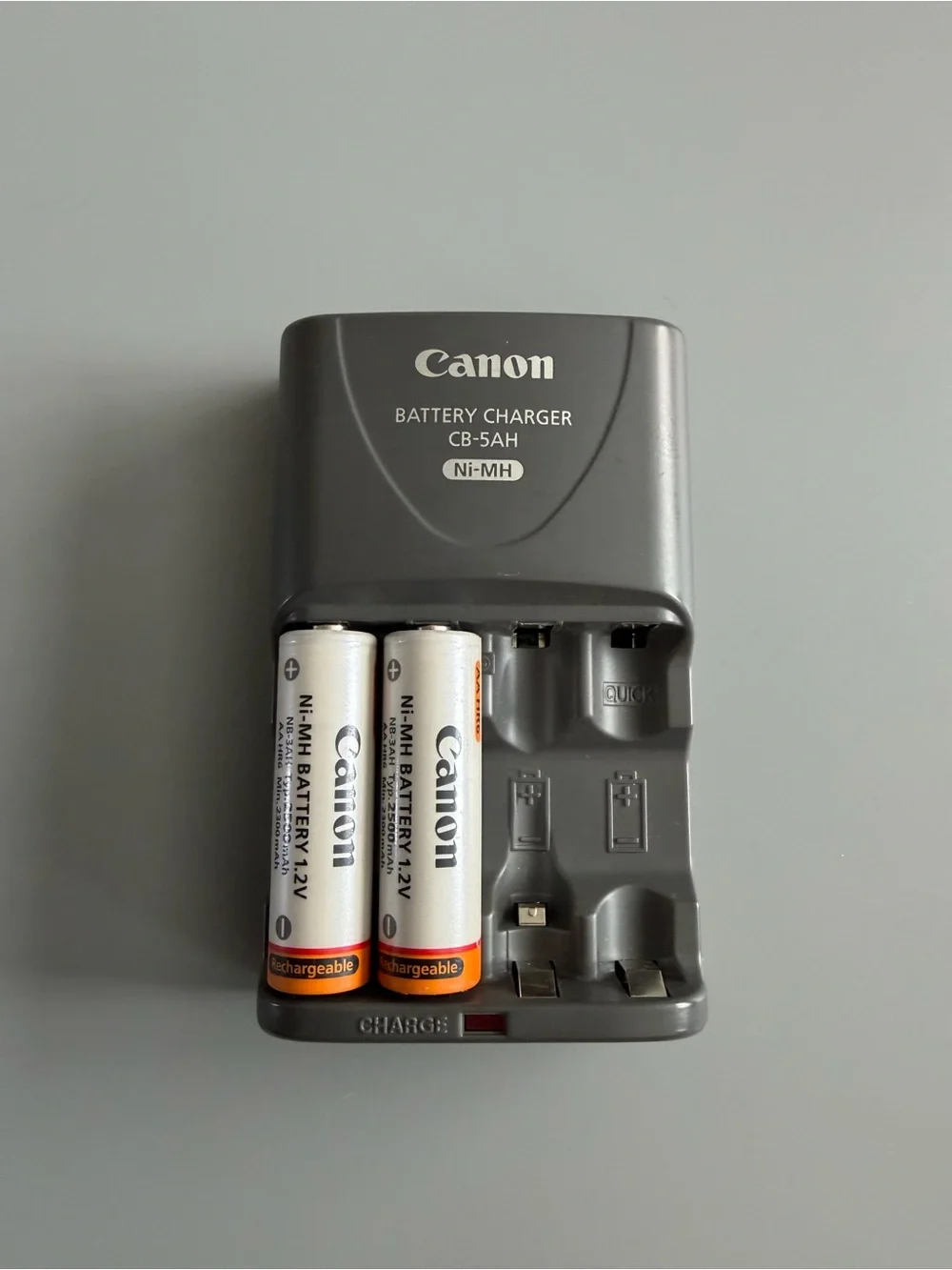 Canon includes charger